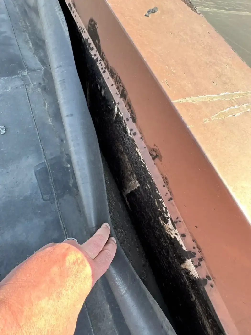 Tarping and dry-in on a Sullivan commercial roof